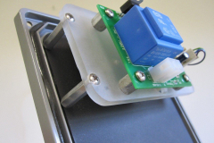The standoffs thread into blind tapped holes in the PVC.