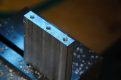The vertical part of the bracket.