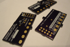 Three boards.  The side with the serial # field is the top.