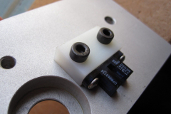 Block with wiring mounted to X plate.
